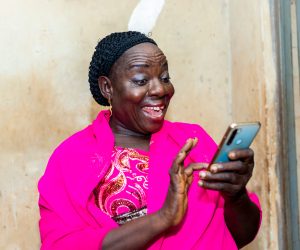 cheerful excited old black african woman receiving some good new How to help mom get well as if I was home?